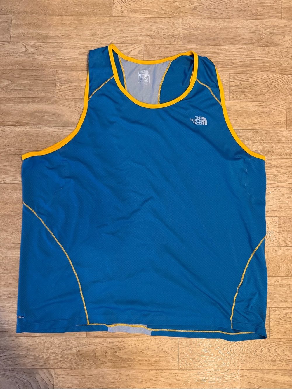 The North Face Blue Mesh Athletic Tank with Yellow/Orange Trim